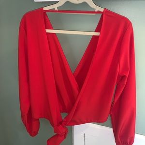 open back, V neck red blouse, size small.